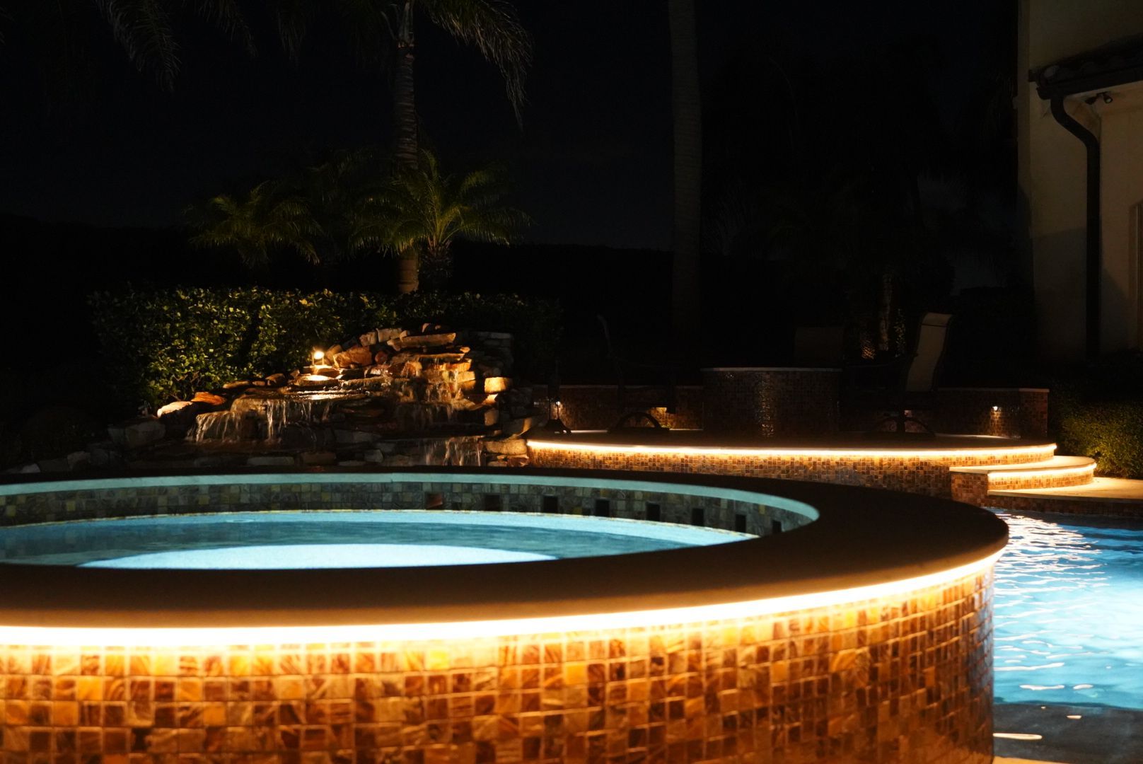Pool and spa with permanent accent lighting